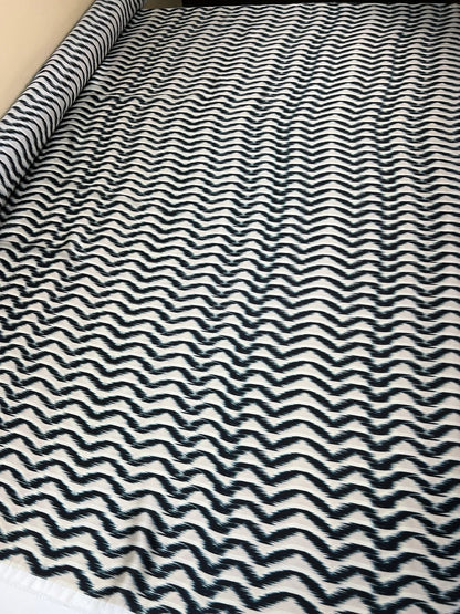 Image of Italian satin fabric in beige and blue with an abstract pattern, 85 g/m2 – available at Šarlotes audumi