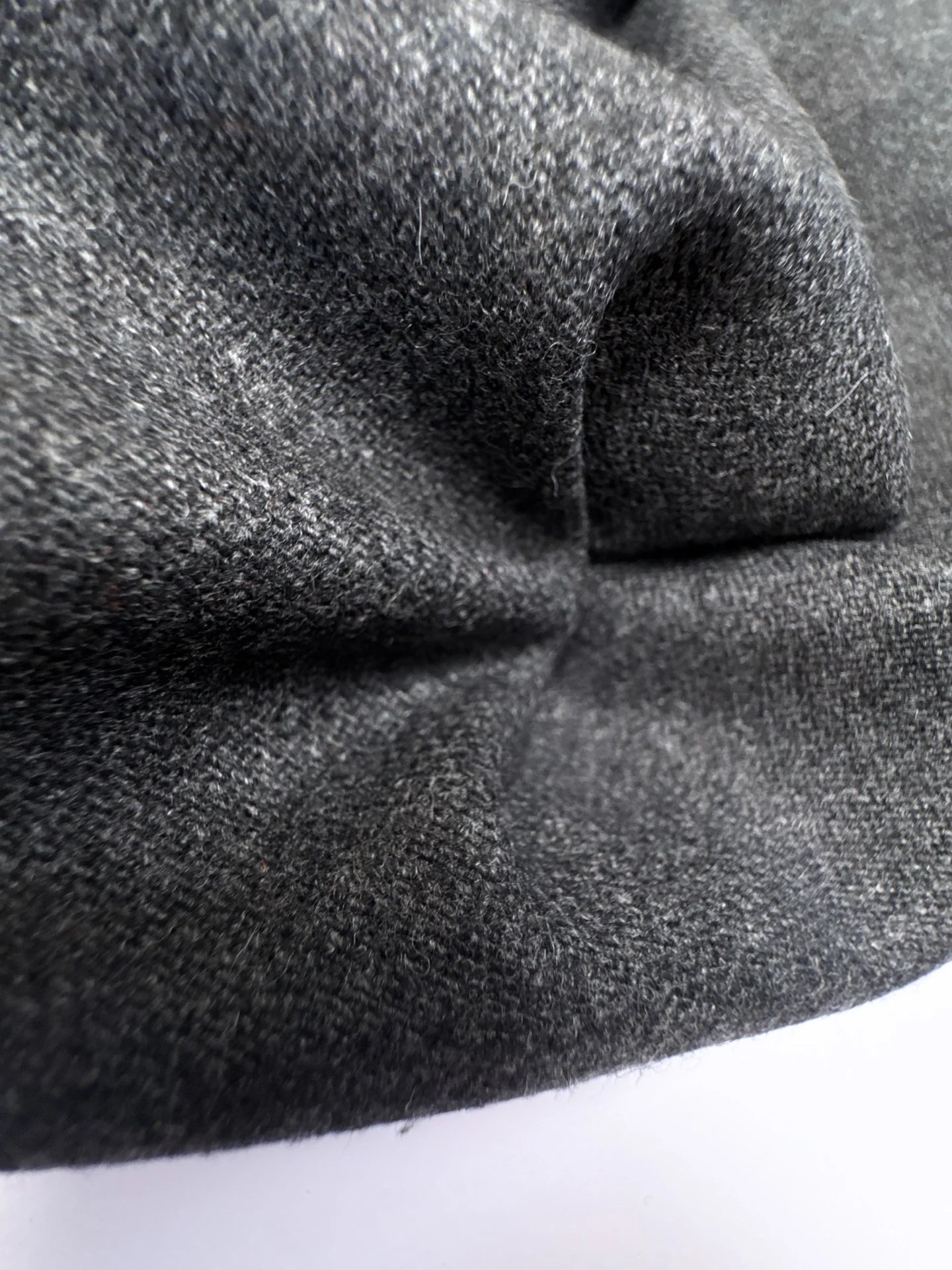 Image of Italian wool fabric in grey with a twill weave, a thicker fabric for suits and outerwear, 275 g m2 – available at Šarlotes audumi