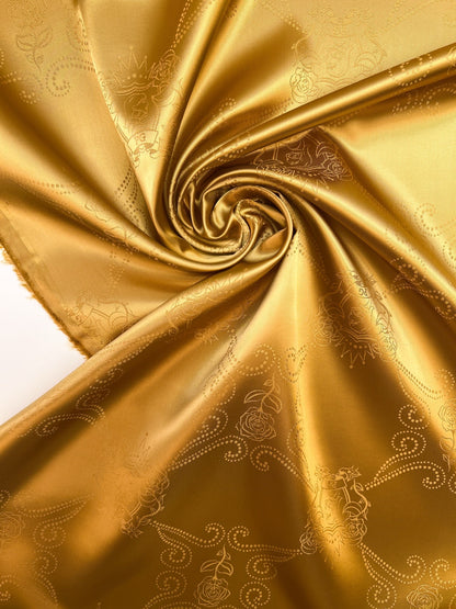 Image of Italian viscose jacquard fabric in a golden tone – available online at Charlotte's Fabrics