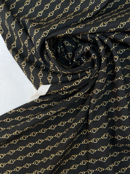 Image with Italian crepe fabric with chain pattern | Polyester 100% | 152 cm – available at Šarlotes audumi
