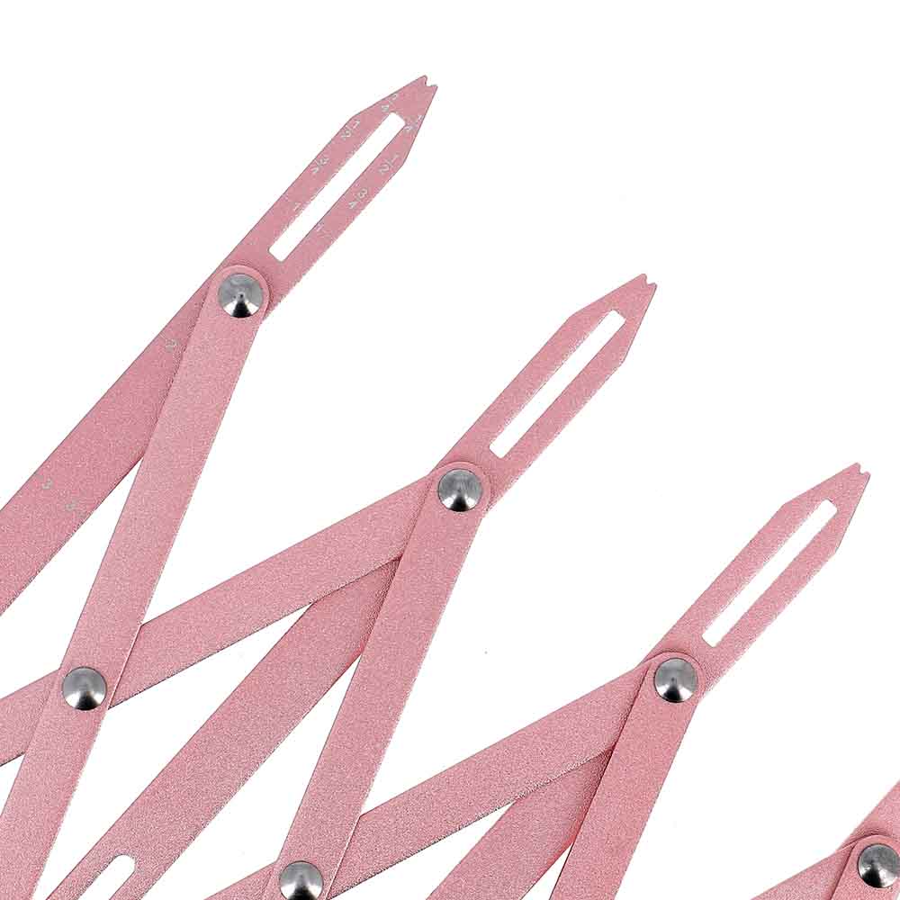 Expandable measuring ruler for placing buttonholes and buttons Bohin