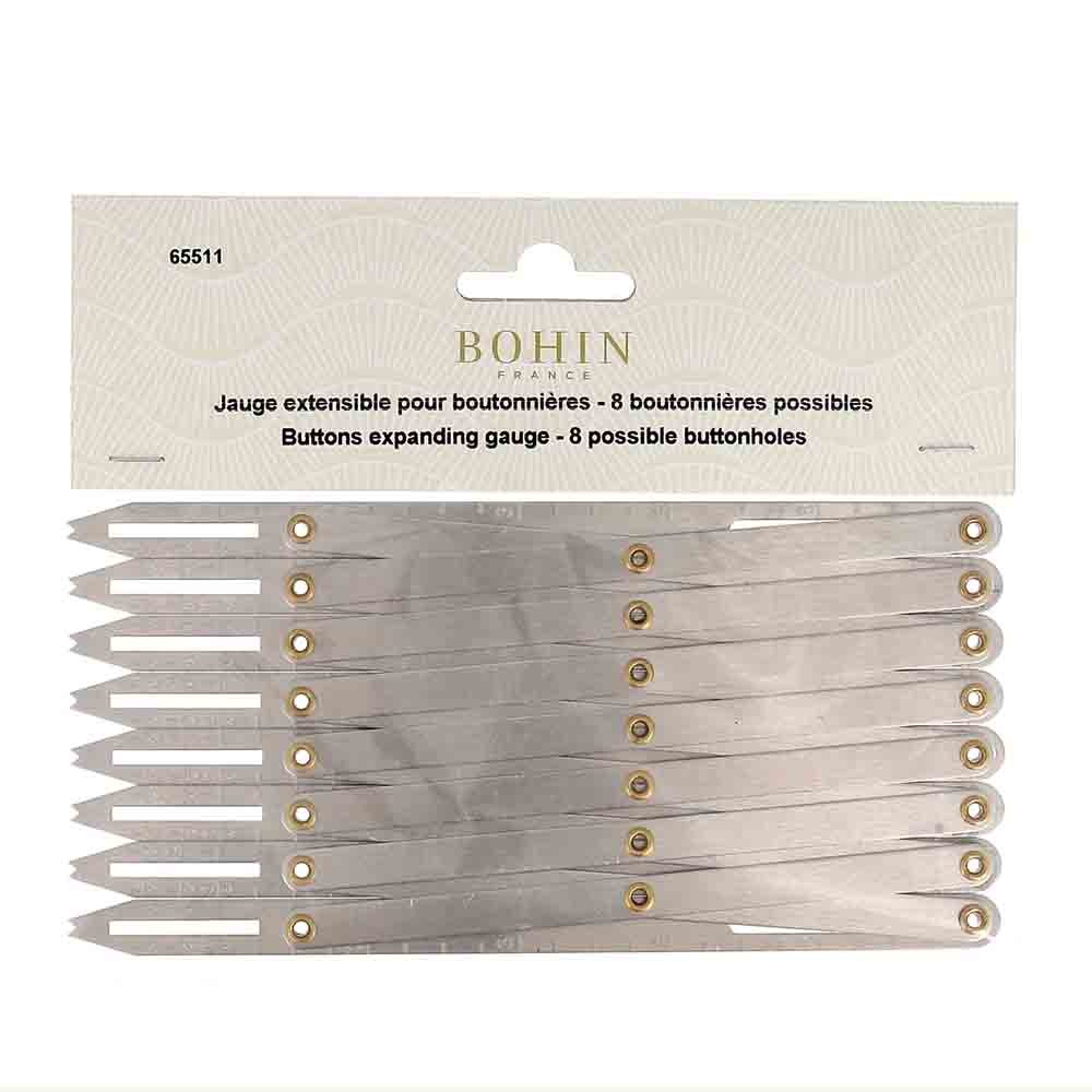 Extendable measuring ruler for placing buttonholes and buttons Bohin