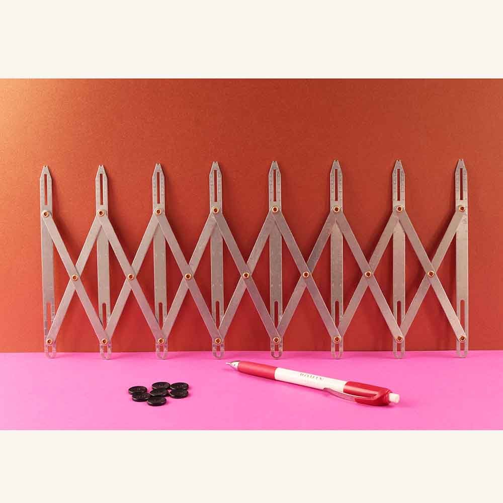Extendable measuring ruler for buttonhole and button placement, Bohin