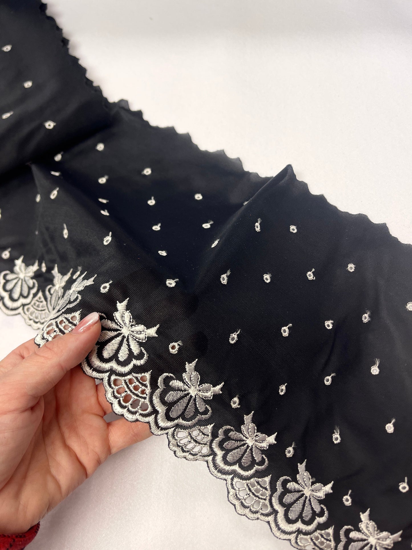 Image of embroidered lace 15 cm - black with white flowers and circles – available at Šarlotes audumi