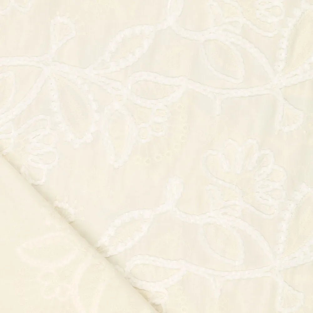Image of embroidered cotton fabric with pattern - butter shade 145 g/m² – available at Šarlotes audumi