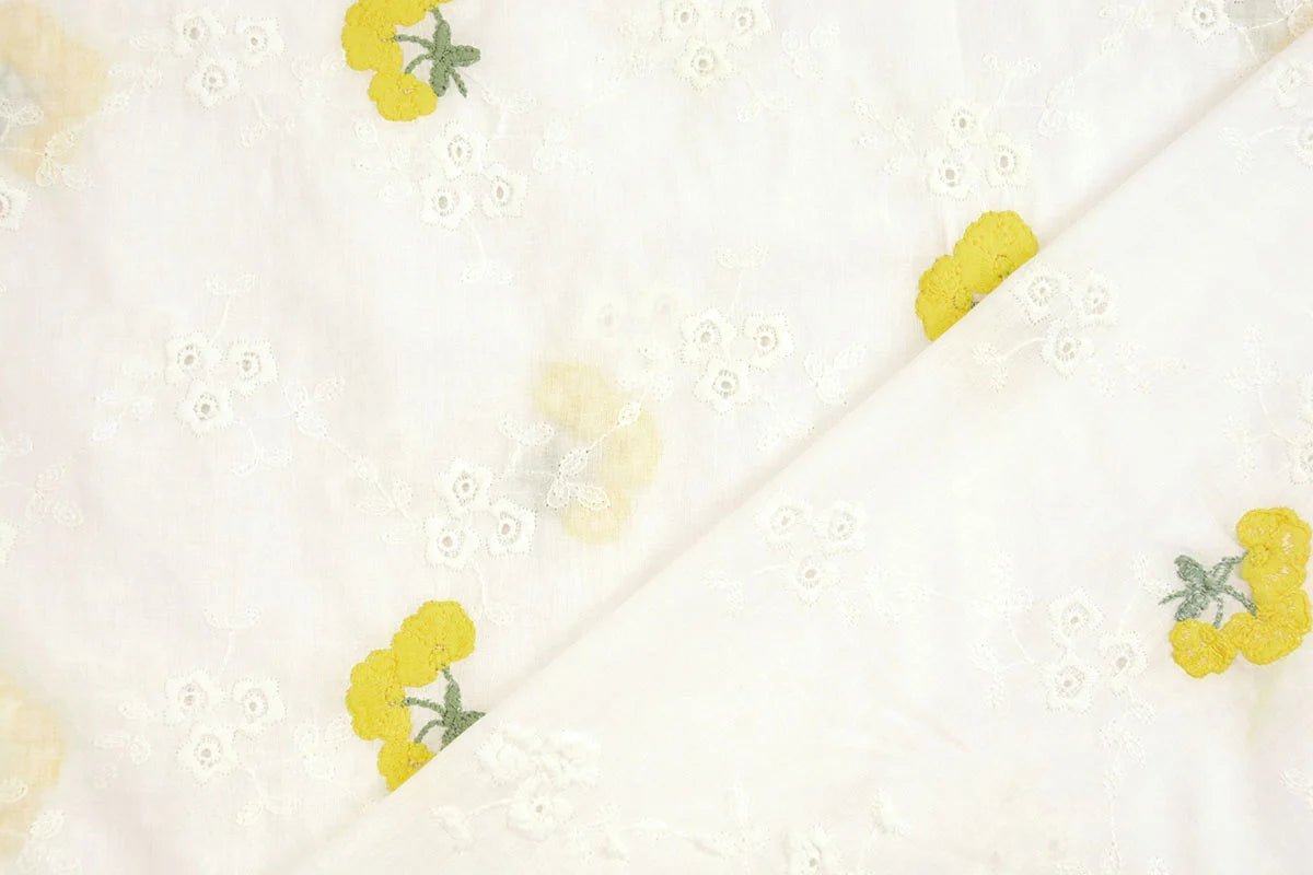 Embroidered cotton fabric - yellow flowers 110 g/m²