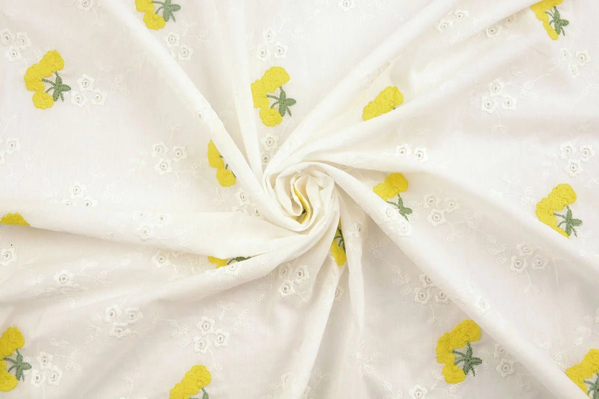 Embroidered cotton fabric - yellow flowers 110 g/m²