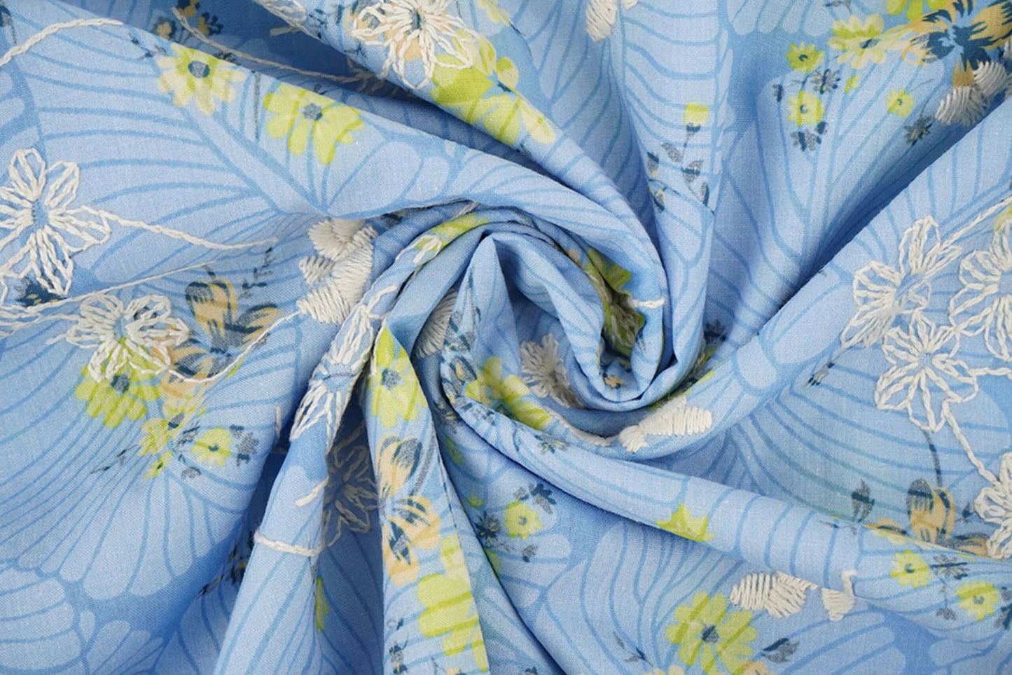 Image of embroidered cotton fabric - yellow flowers on blue 115 g/m² – available at Šarlotes audumi