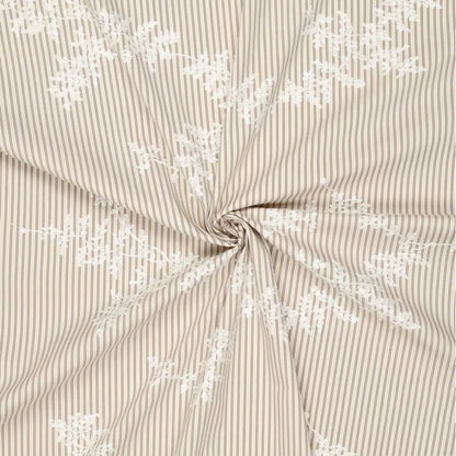 Image of embroidered cotton fabric with lines and white embroidered flowers – available online at Šarlotes audumi