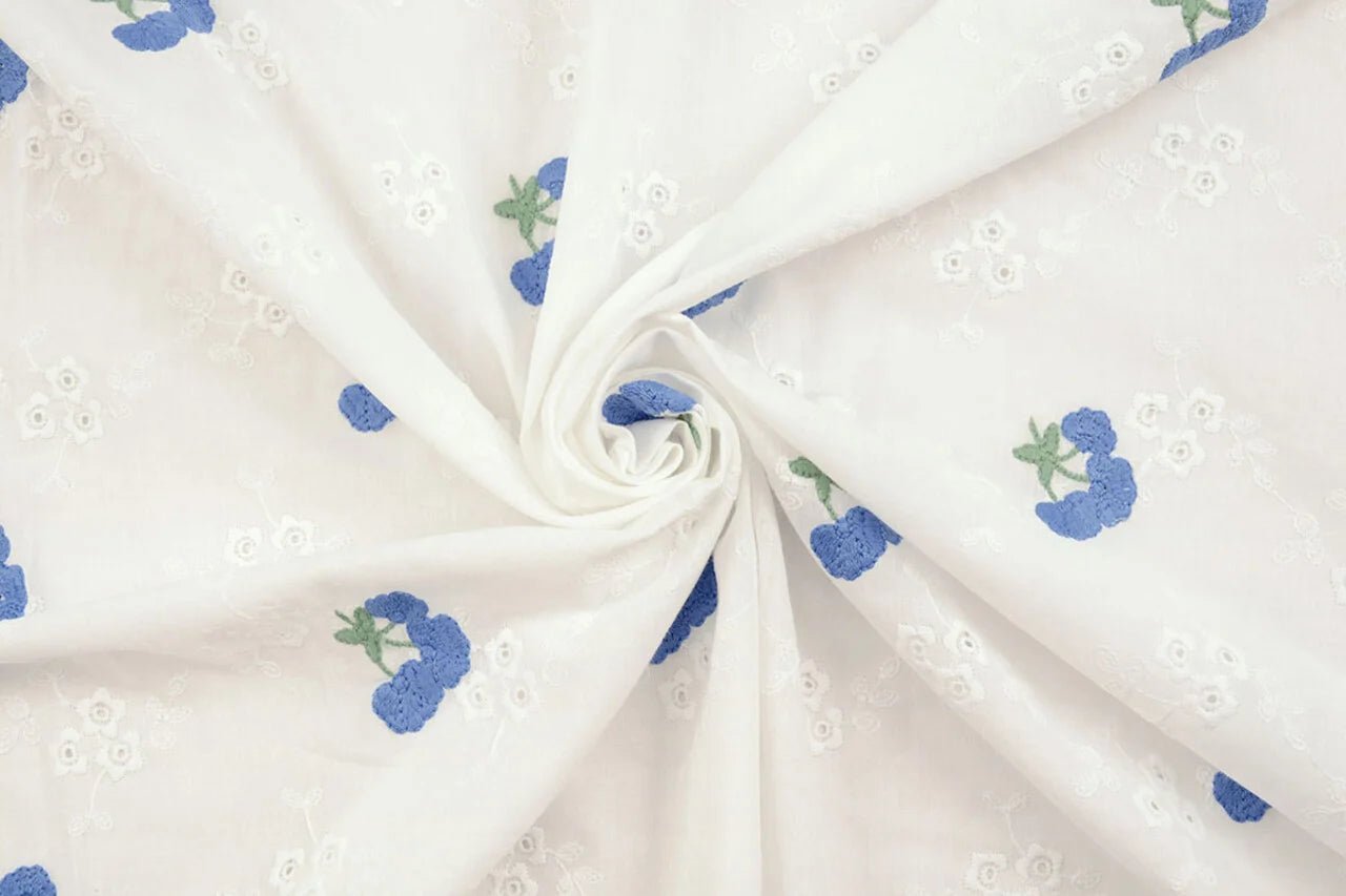 Embroidered cotton fabric - blue flowers 110 g/m²