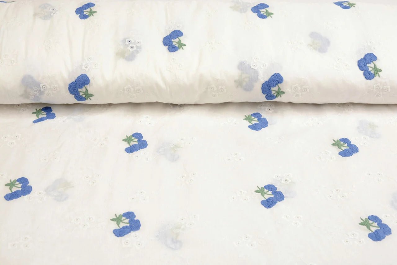 Embroidered cotton fabric - blue flowers 110 g/m²