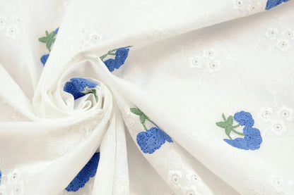 Embroidered cotton fabric - blue flowers 110 g/m²