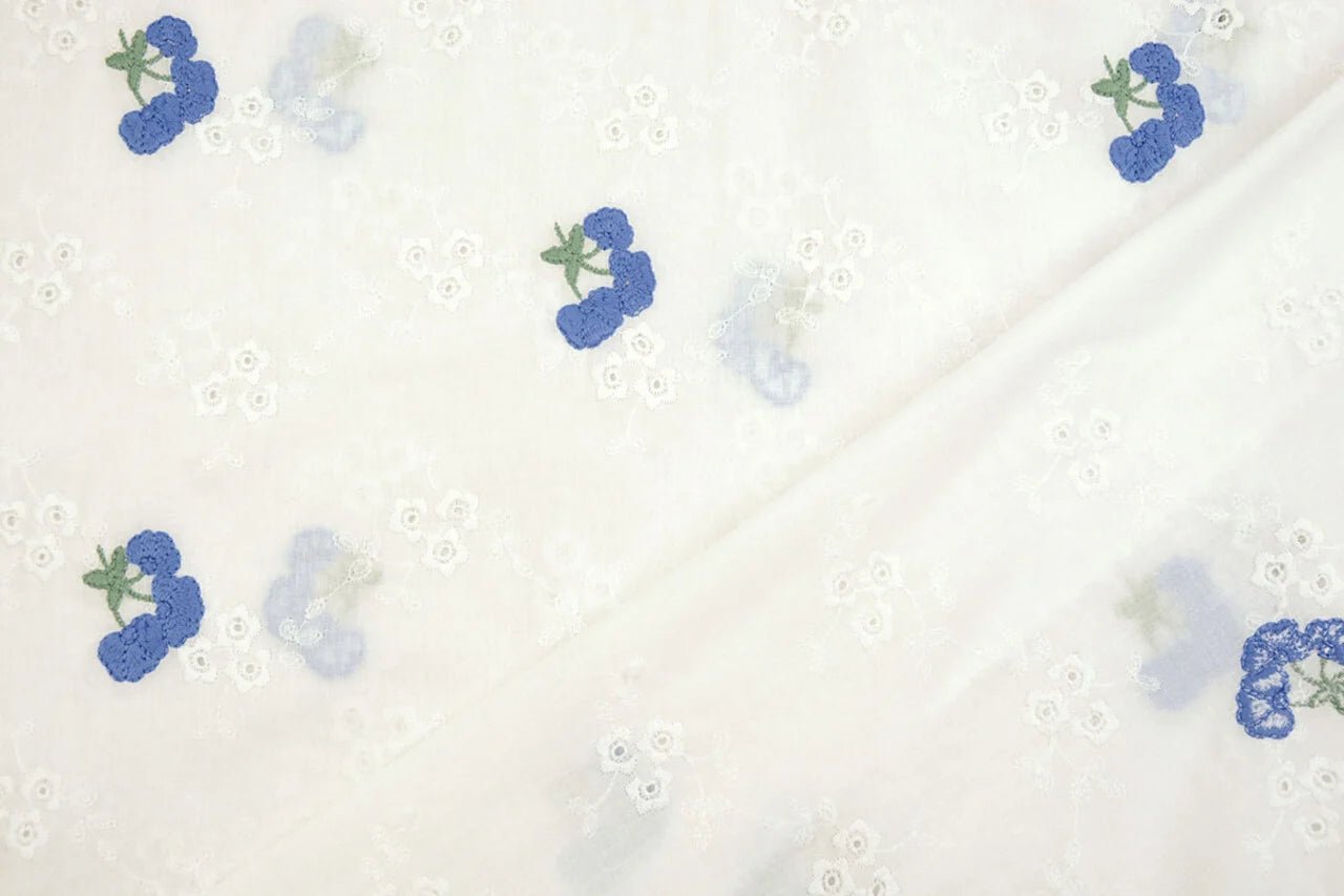 Embroidered cotton fabric - blue flowers 110 g/m²
