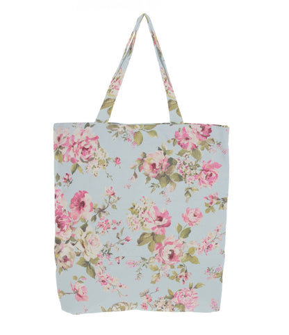 Tkanina canvas w róże na jasnoniebieskim tle 200 g/m²