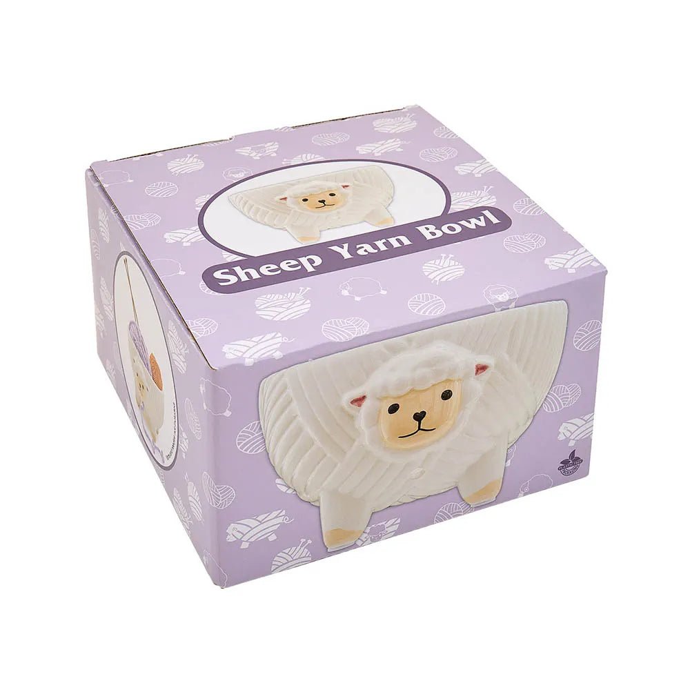 Image of a white ceramic yarn bowl sheep by Sew Tasty – available at Charlotte's Fabrics