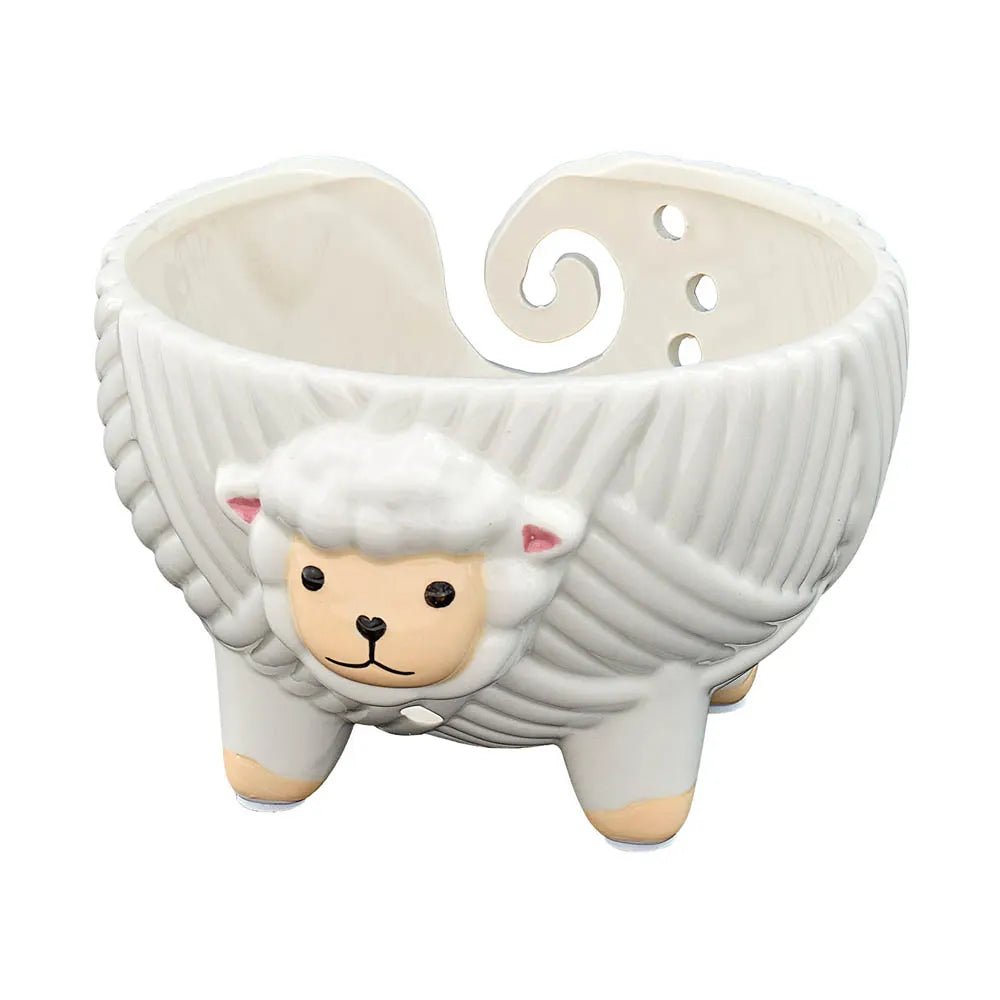 Image of a ceramic yarn bowl sheep, white Sew Tasty – available at Charlotte’s Fabrics