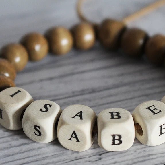 Wooden beads with letters, 10×10 mm|80 pcs.