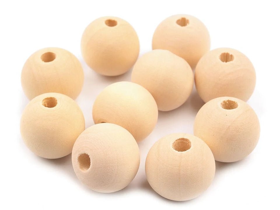 Attēls ar Koka pērlītes Ø18 mm | Dabīgs, neapstrādāts koks – pieejams internetā Šarlotes audumi