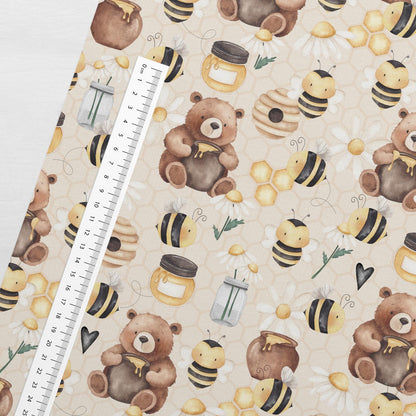 Image with cotton looped knit bears and bees – available online at Šarlotes audumi