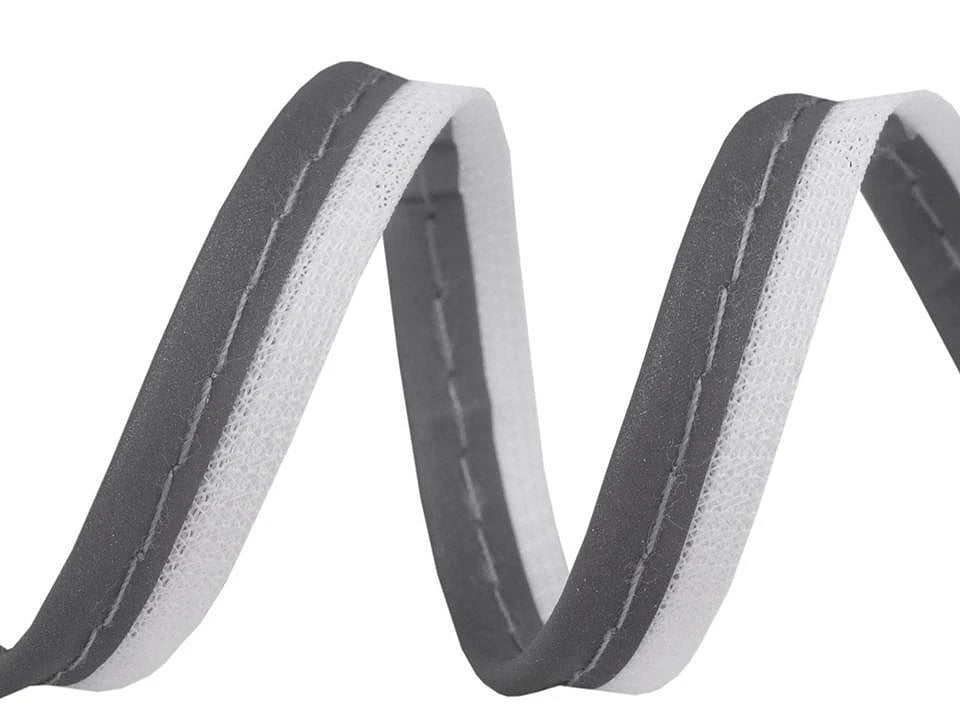 alt
Image with cotton ribbon, edging ribbon with cord 10 mm - reflective – available at Charlotte's Fabrics