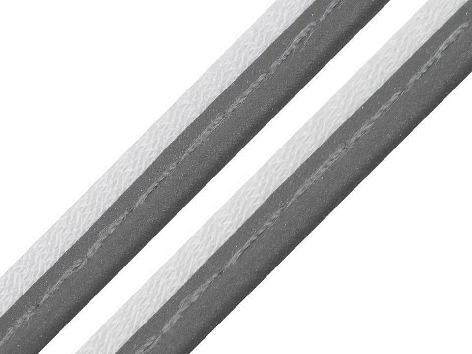 Image with cotton ribbon, edging ribbon with cord 10 mm - reflective – available at Šarlote fabrics
