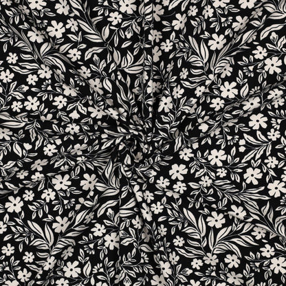 Image with cotton jersey - white flowers on black 200 g/m² – available at Šarlotes audumi