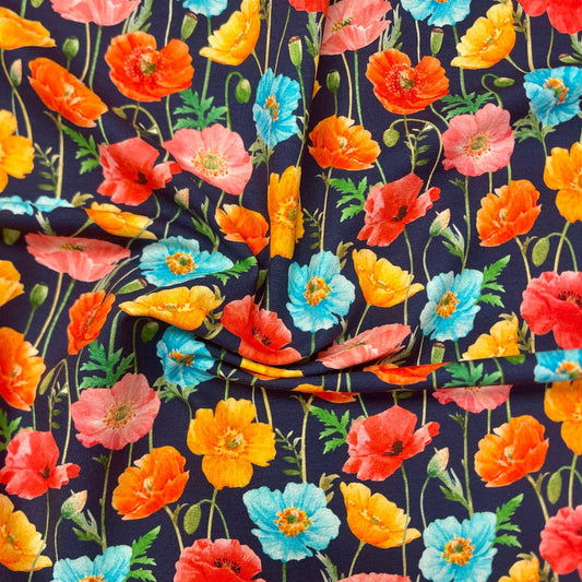 Cotton jersey - colorful poppies on a dark blue background 250 g/m²