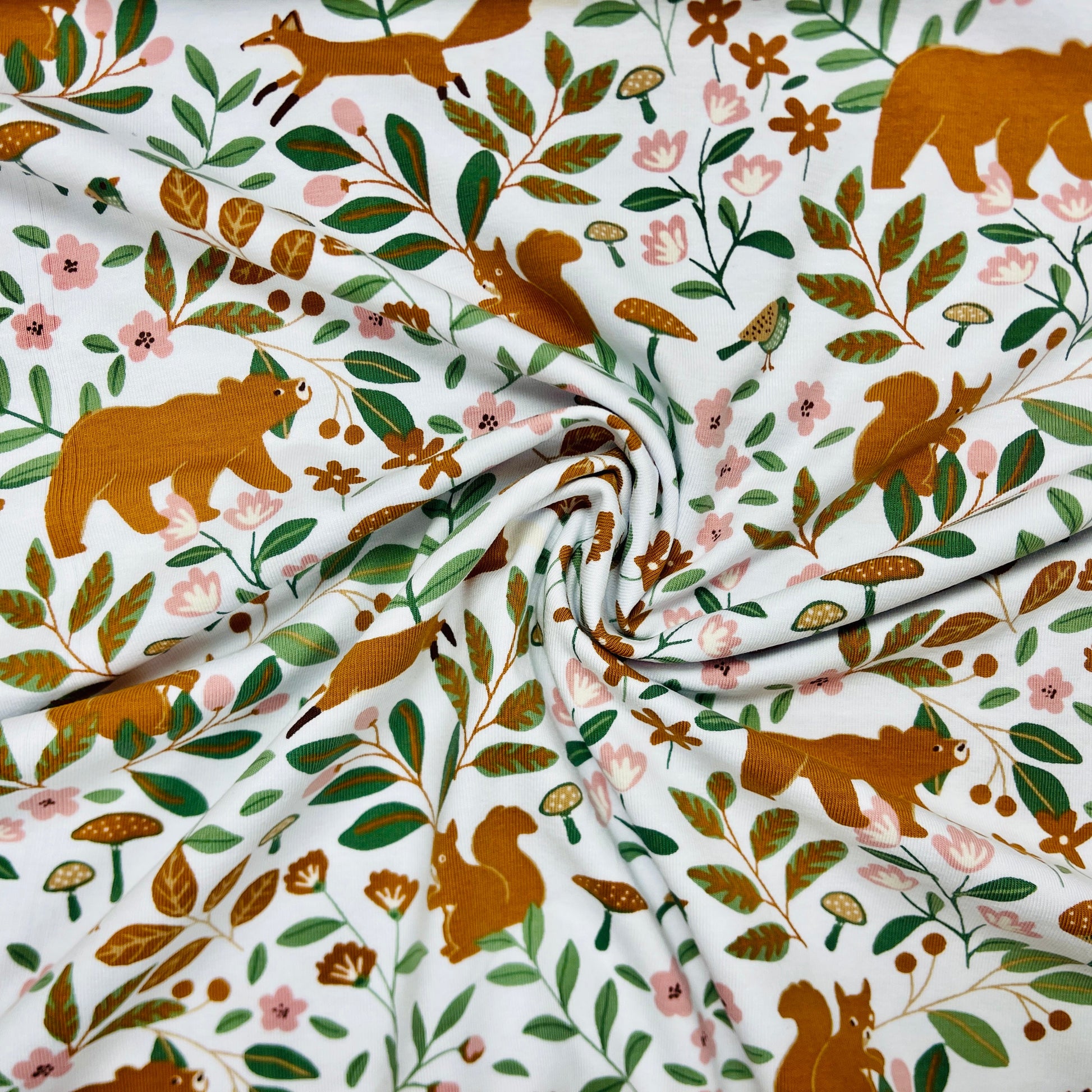 Cotton jersey - forest animals in leaves 200 g/m²
