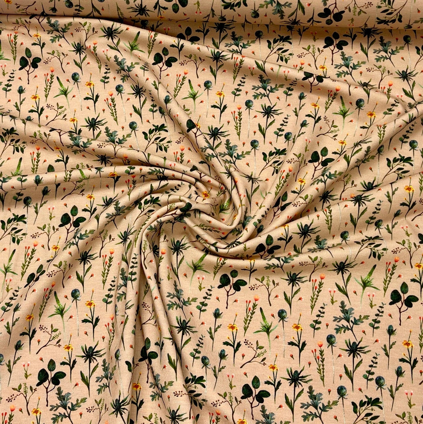 Cotton jersey - meadow on a beige background 210 g/m²