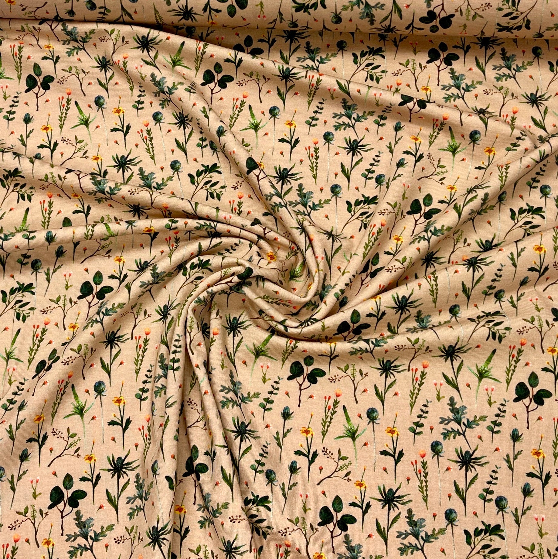 Cotton jersey - meadow on a beige background 210 g/m²
