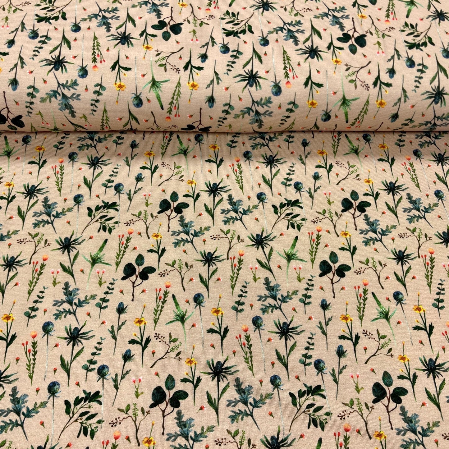 Cotton jersey - meadow on a beige background 210 g/m²