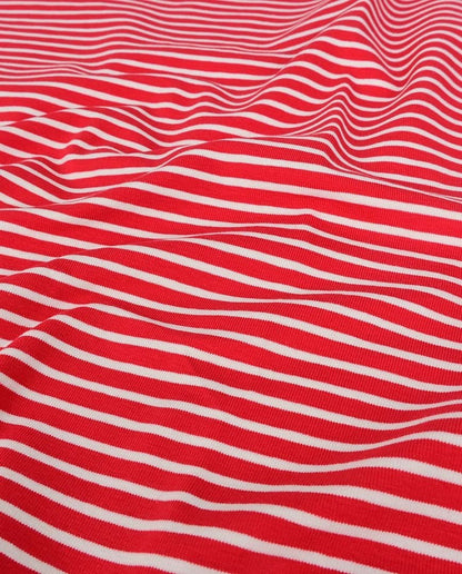 Image with cotton knit fabric - red stripes 220 g/m² – available at Šarlotes audumi