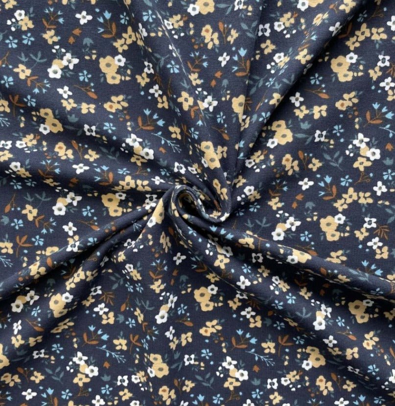 Image with Cotton jersey - small flowers on dark blue 200 g/m² – available at Šarlotes audumi