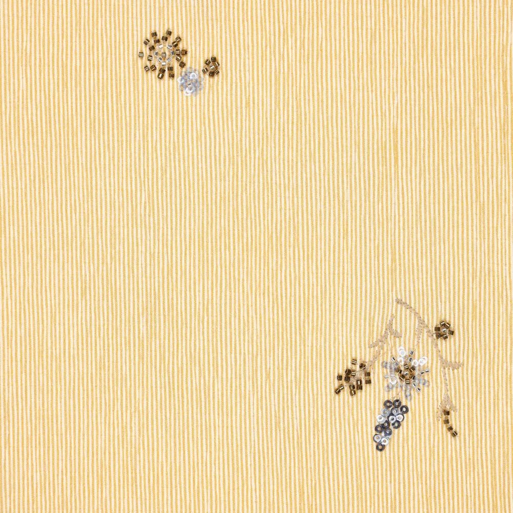 Image of a shirt fabric with elastane - yellow striped with embroidered beads 135 g/m² – available at Charlotte's fabrics