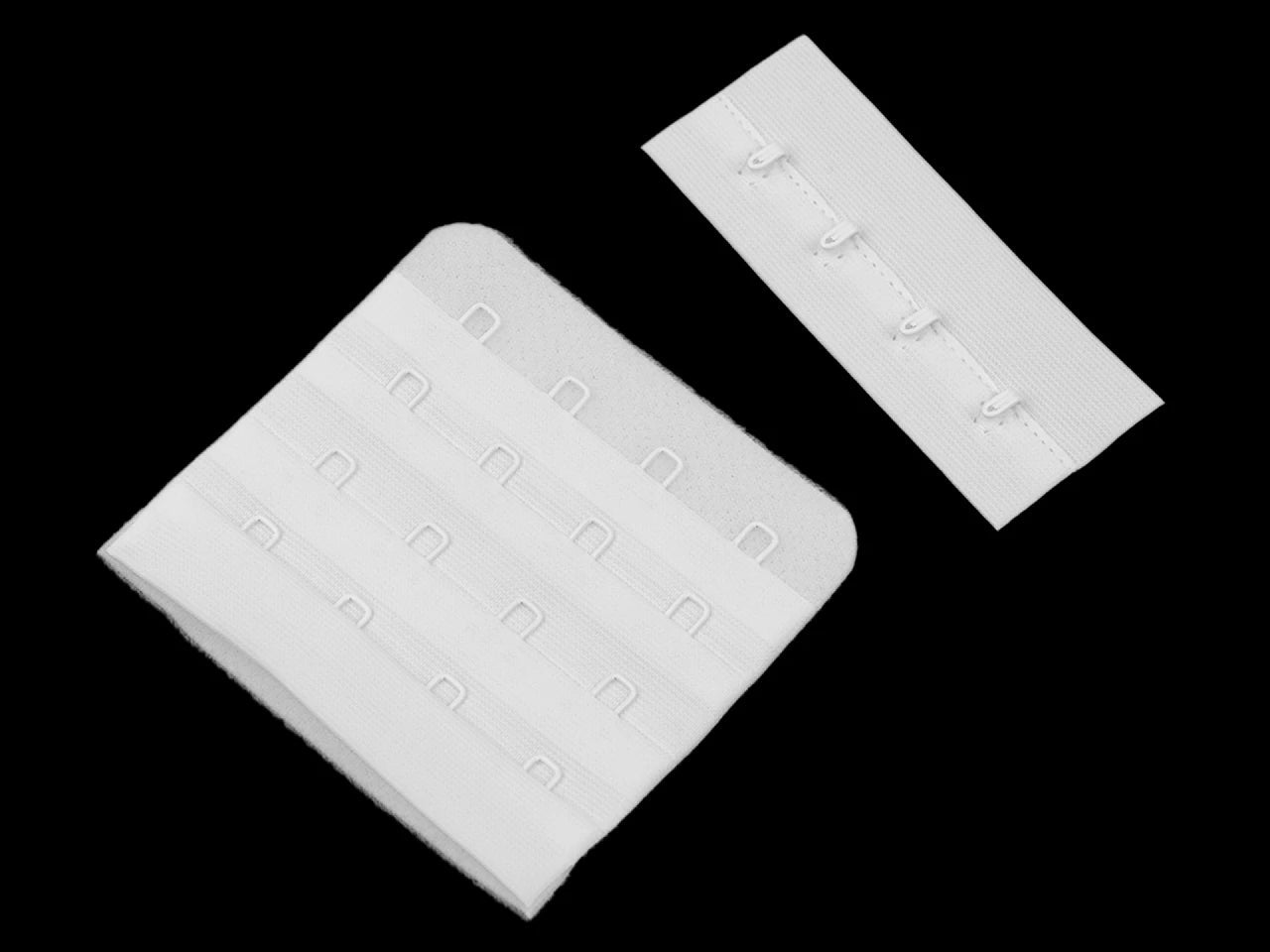 Image of a bra hook-and-eye closure, 4 hooks, 70 mm – available at Charlotte Fabrics