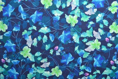 Image of linen with cotton - leaves on a blue background 170 g/m² – available at Charlotte's Fabrics