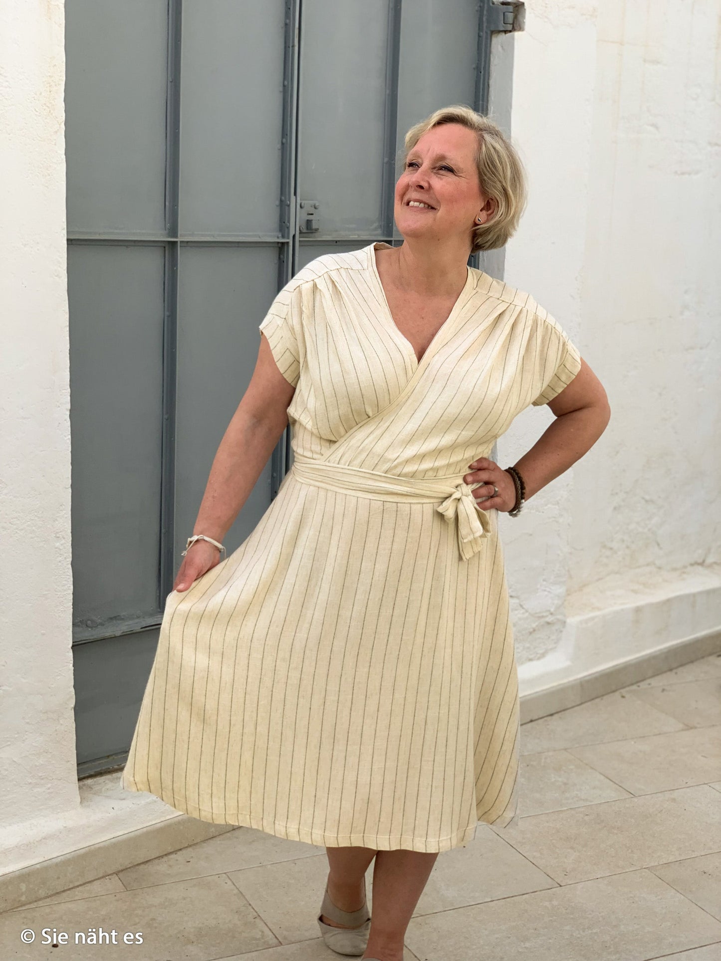 Linen with viscose - stripes on a natural beige background 200 g/m²