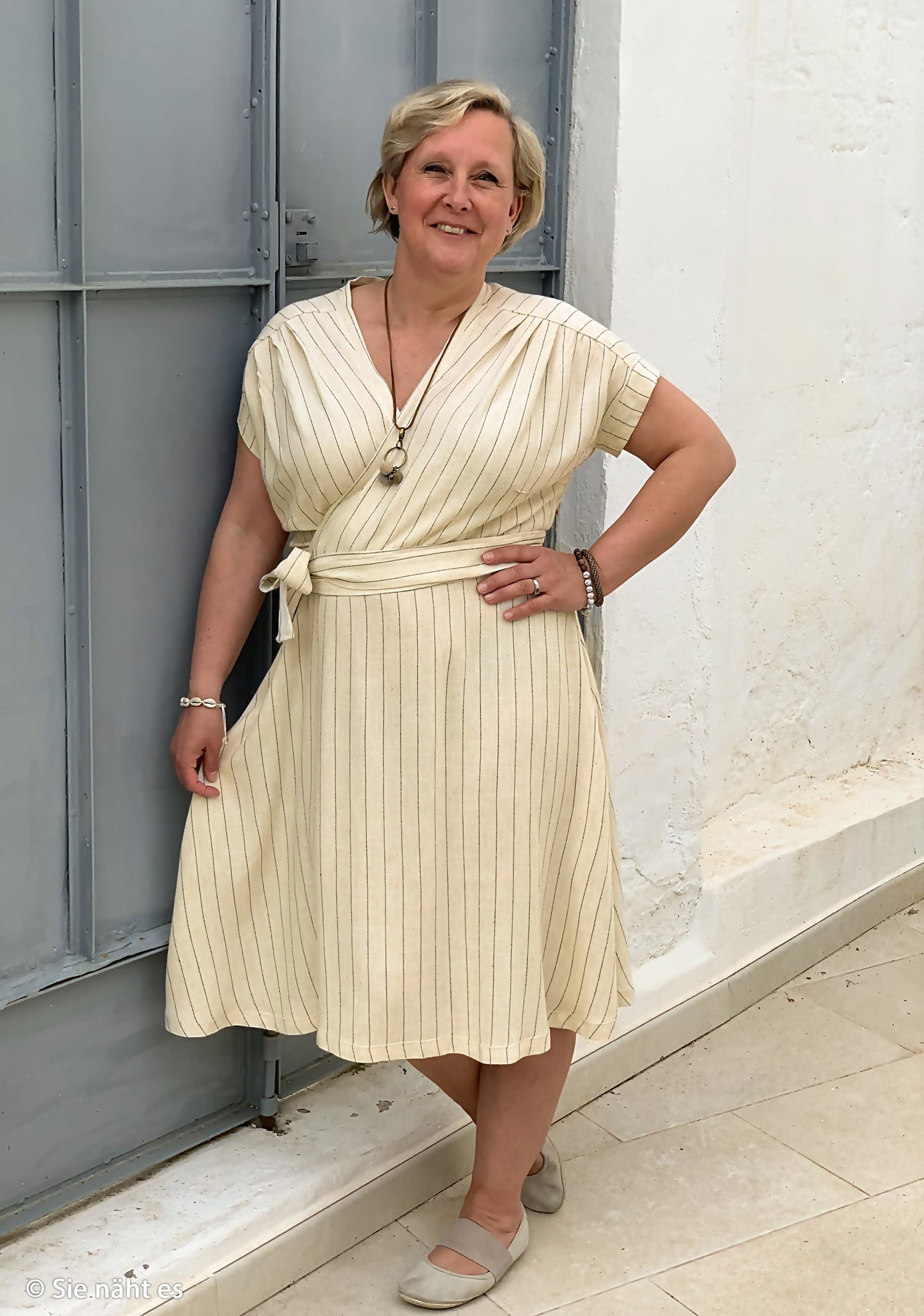 Linen with viscose - stripes on a natural beige background 200 g/m²
