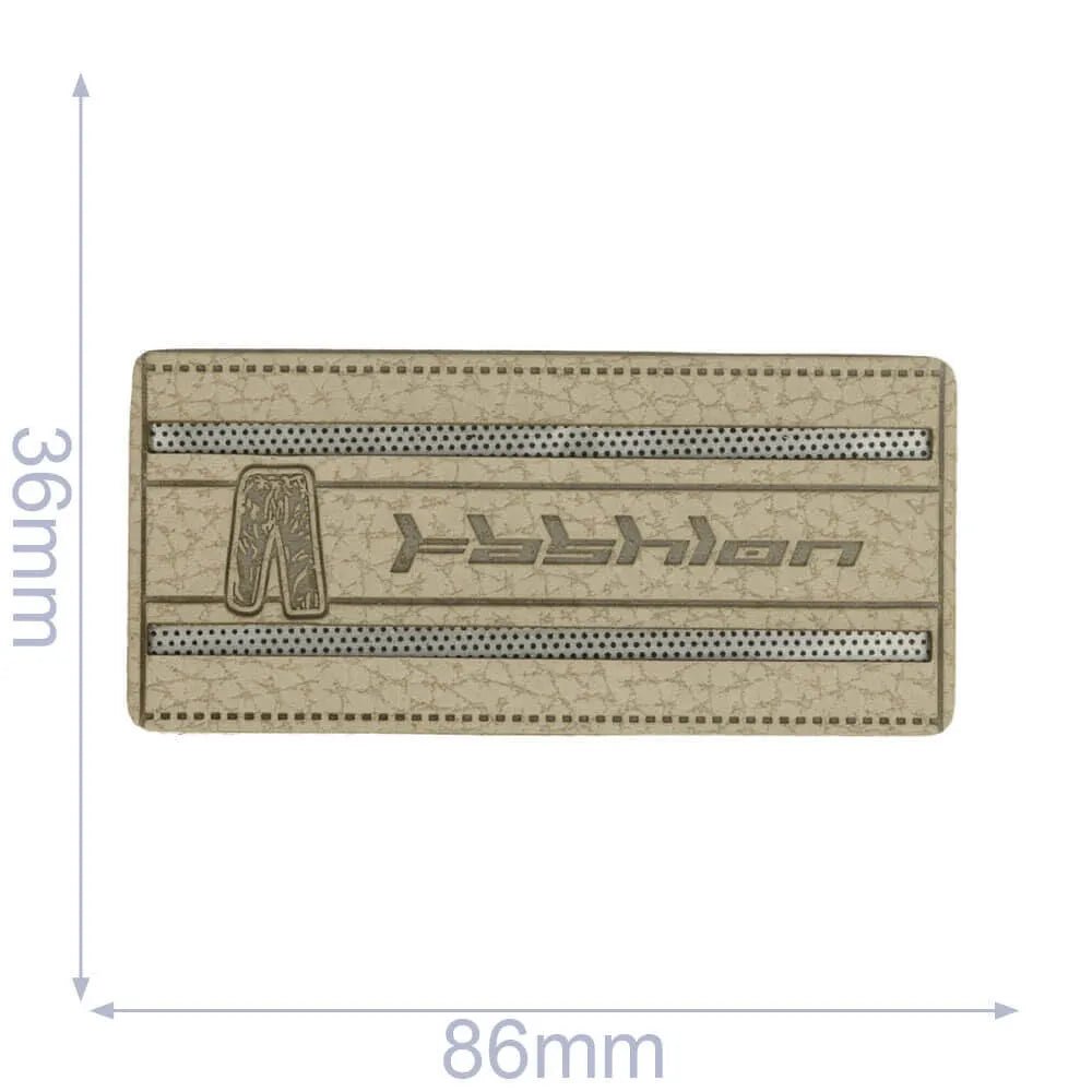 Attēls ar Mākslīgās ādas etiķete 86×36 mm (pelēka) – pieejams Šarlotes audumi