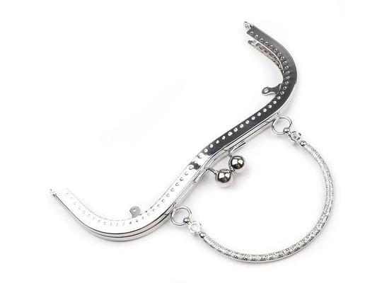 alt
Image of a metal purse frame with handle for sewing, 5 × 8 cm | assorted shades – available at Šarlotes audumi