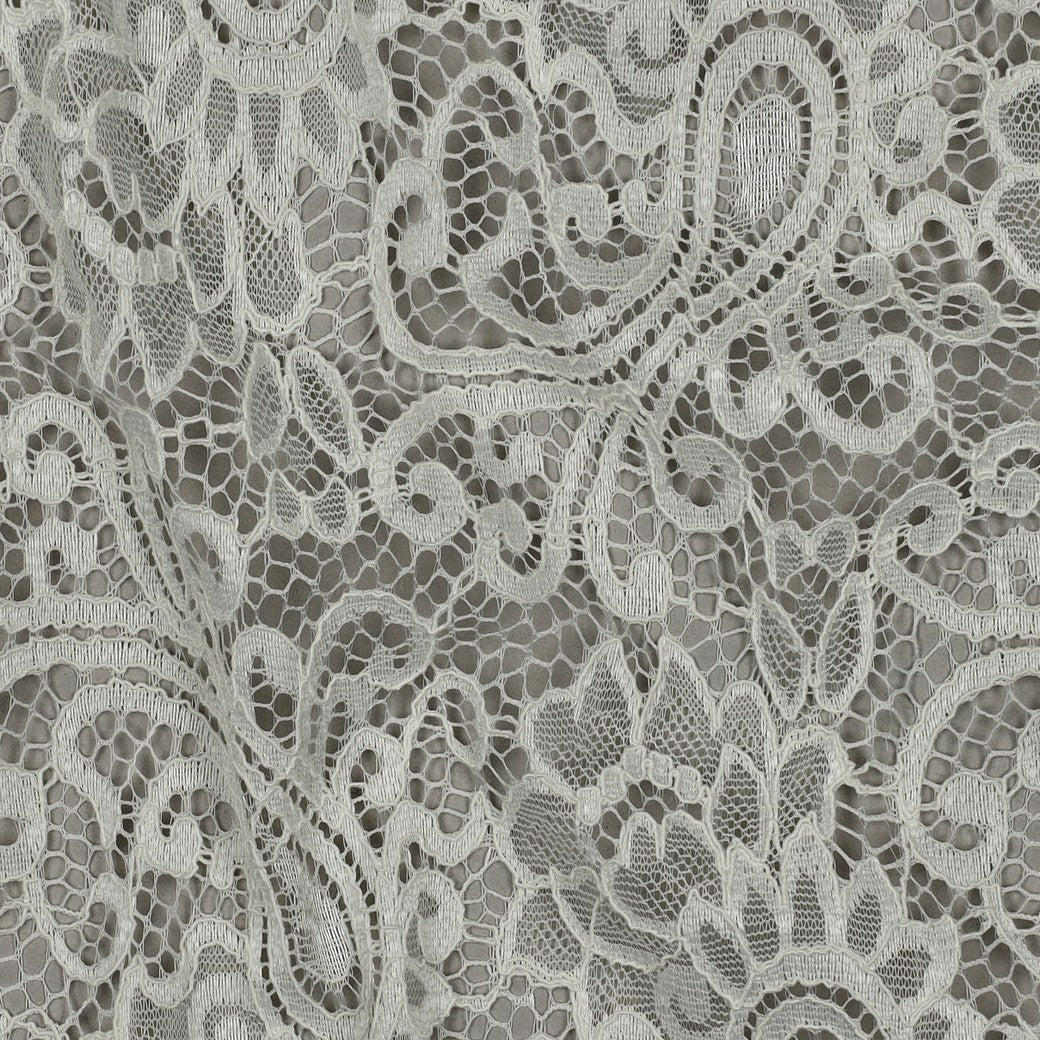 Image of lace fabric - warm white 130 g/m² – available at Charlotte's Fabrics