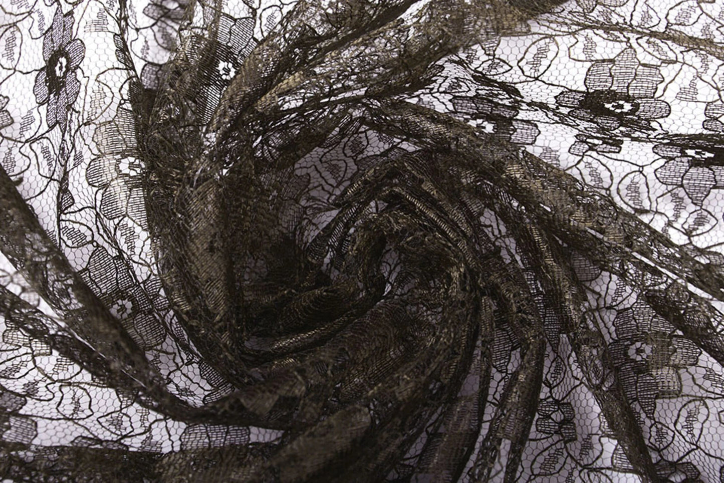 Image with delicate lace fabric - chocolate brown flowers 75 g/m² – available at Charlotte Fabrics