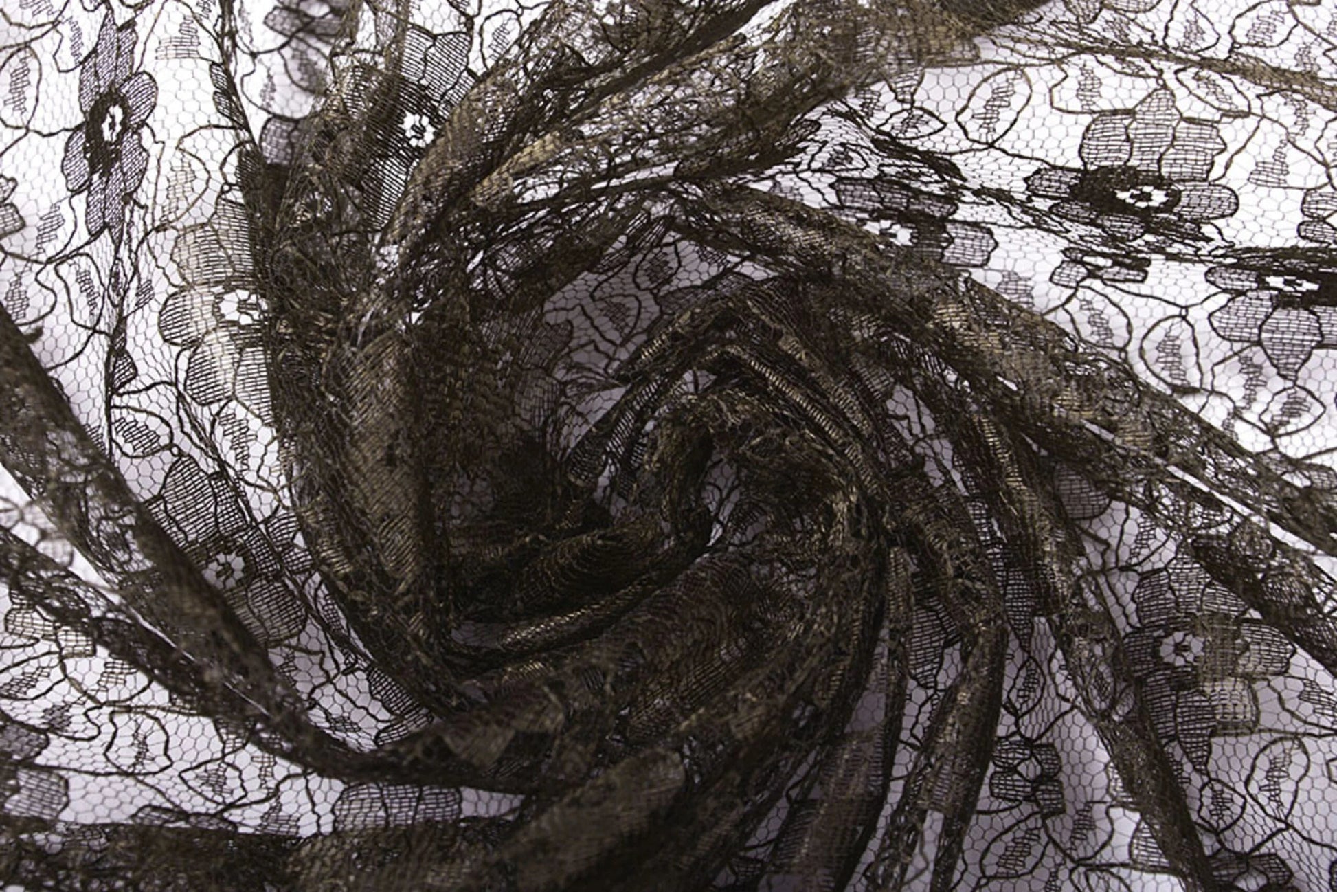 Image with delicate lace fabric - chocolate brown flowers 75 g/m² – available at Charlotte Fabrics