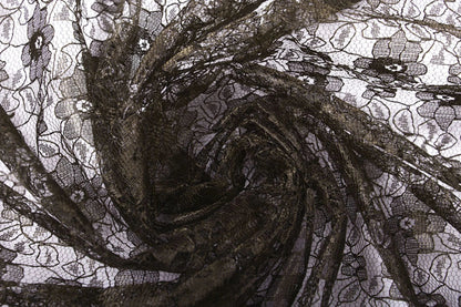 Image with delicate lace fabric - chocolate brown flowers 75 g/m² – available at Charlotte Fabrics