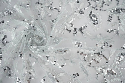 alt
Image with lace fabric|Embroidered tulle with sequins 160 g/m² - silver – available at Charlotte's fabrics
