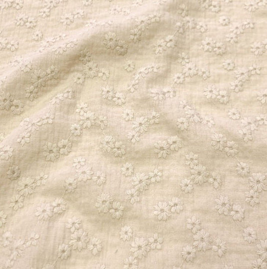 Image of embroidered muslin - beige flowers 180 g/m² – available at Charlotte's Fabrics