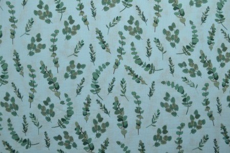 Muslin - eucalyptus on a blue background 140 g/m²