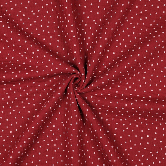 Muslin with dots on a dark red background 125 g/m² – available at Šarlotes audumi