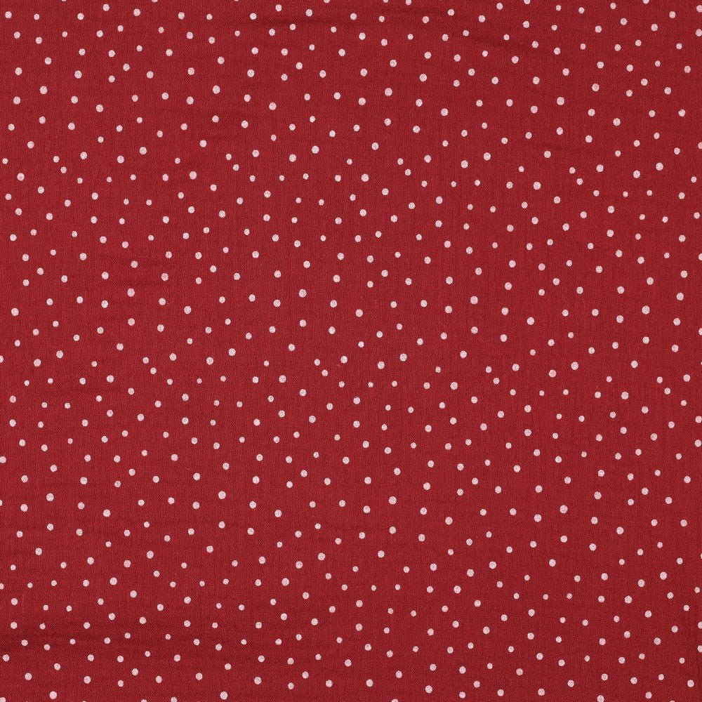 Muslin with polka dots on a dark red background, 125 g/m² – available at Šarlotes audumi