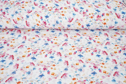 Image of blue and pink floral muslin – available online at Šarlotes audumi